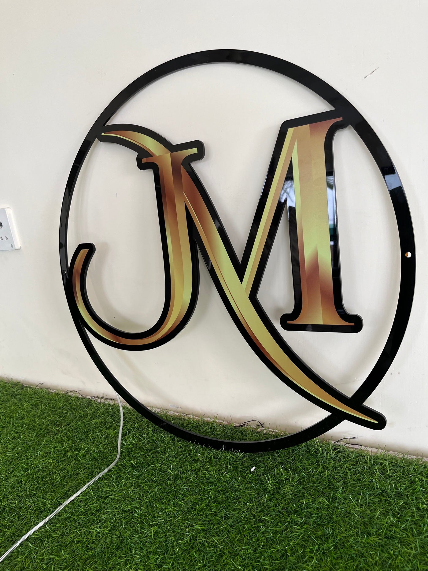 2mm monogram sign with backlit for Monika Madlani