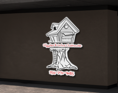 Business signage for Giggles and Grins Clubhouse